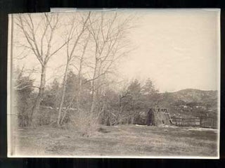 Item #46692 Photograph of a Hut and a Wooden Fence. Photograph
