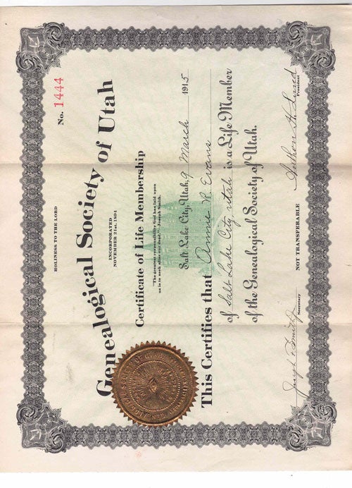 Item #61238 Genealogical Society of Utah Certificate of Life Membership. Salt Lake City, Utah, 9 March 1915. This certifies that Annie R. Evans of Salt Lake City, Utah is a Life Member of the Genealogical Society of Utah. Signed by Joseph F. Smith Jr. (Secretary) and Anthon H. Lund (President)