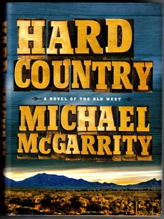 Item #68844 Hard Country (Inscribed association copy). Michael McGarrity, Inscribed to N. Scott...